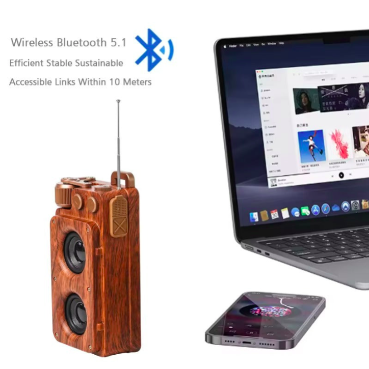 Wooden Bluetooth speaker next to a laptop and smartphone on a white background