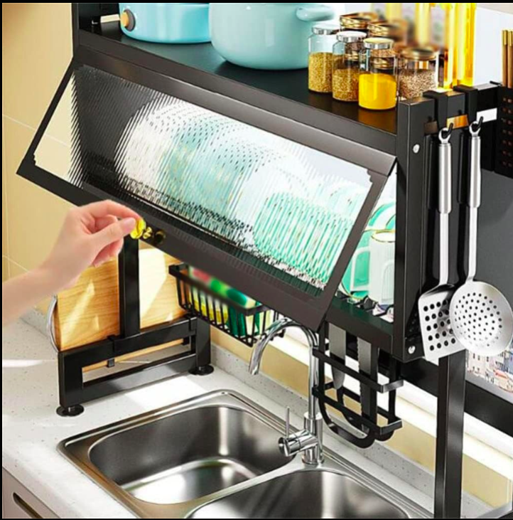 Kitchen dish rack with utensils and dishes above a sink