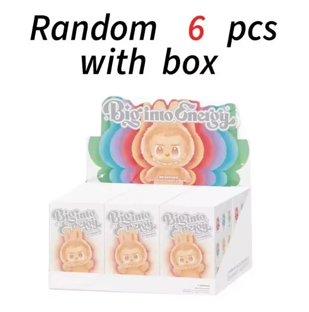 Box of 'Big into Energy' figurines with colorful packaging on a white background