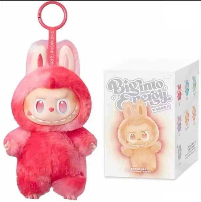 Plush toy in a pink bunny costume with packaging labeled 'Big into Stegg' on a white background