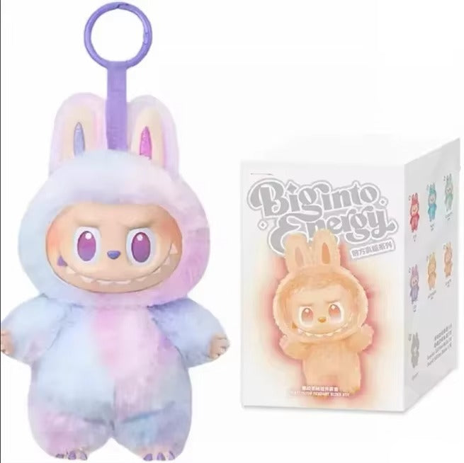 Plush toy with pastel colors and a matching box on a white background