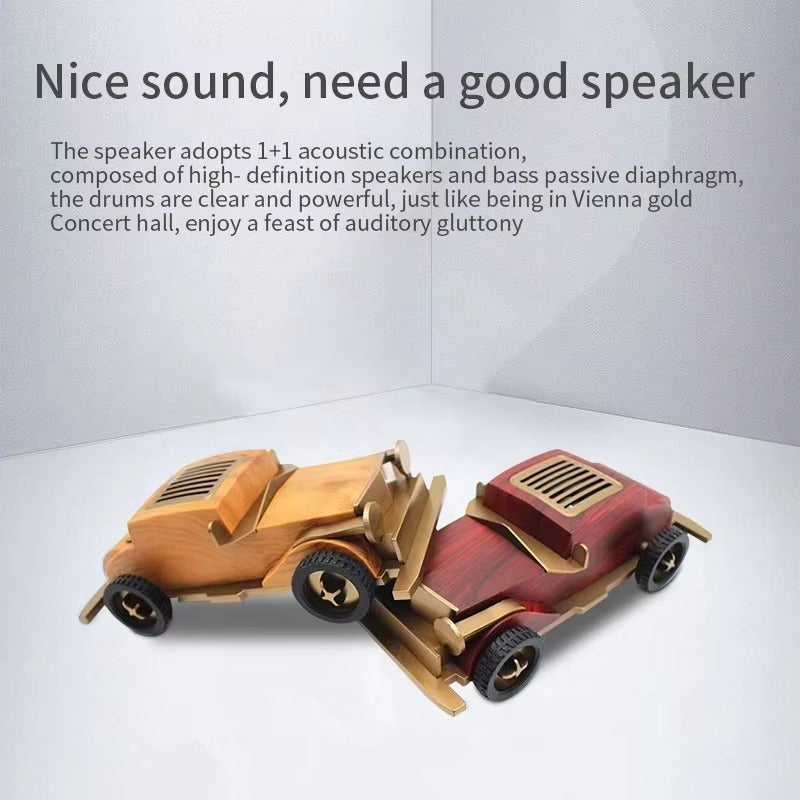 Two wooden toy cars on a white surface with promotional text about a speaker system.