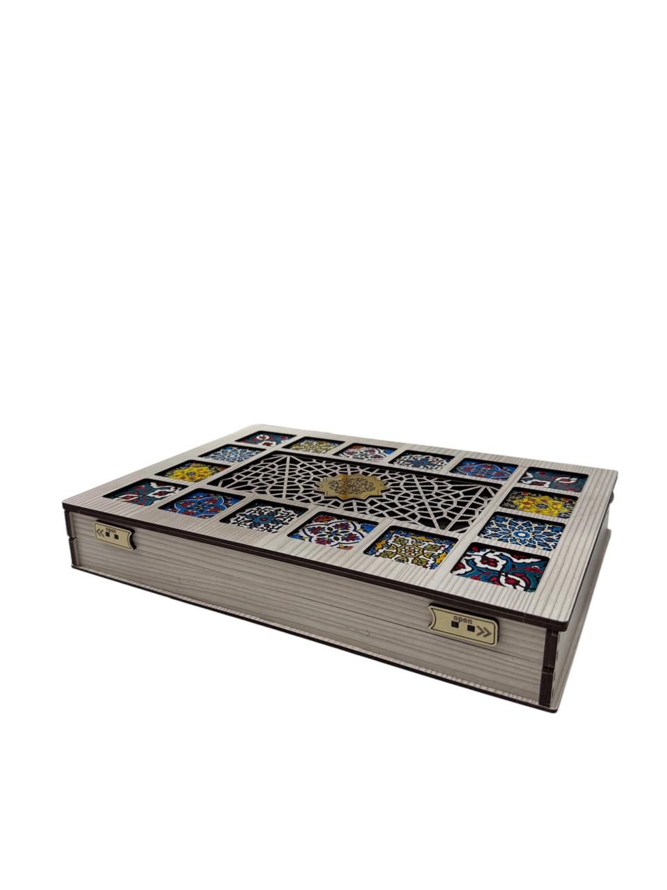 Decorative box with mosaic design on a white background