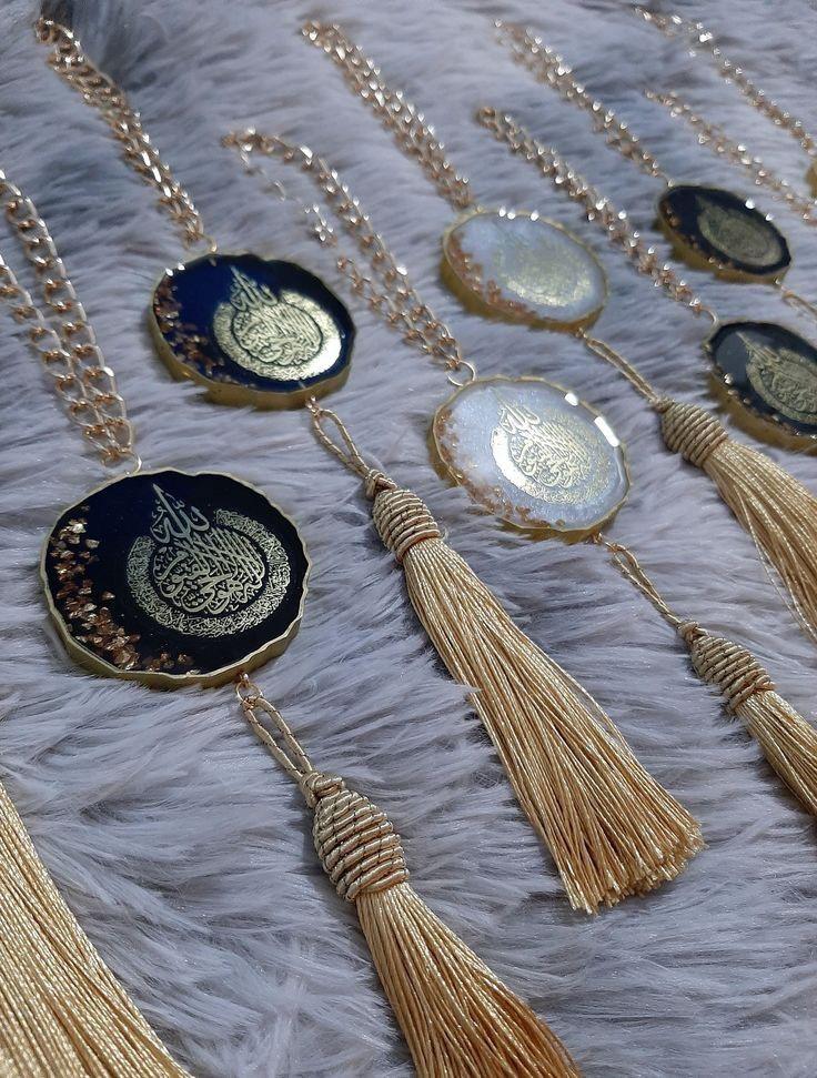 Necklaces with tassels on a textured surface