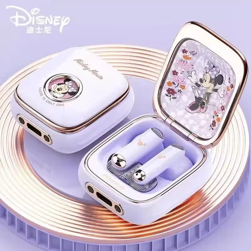Disney-themed wireless earbuds in a case on a purple background
