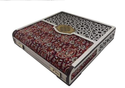 Decorative box with intricate patterns on a white background