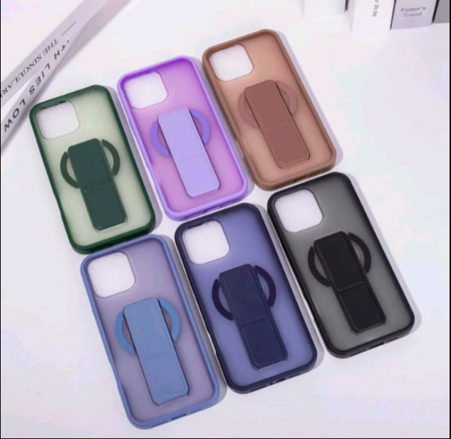 Set of six phone cases with colorful grips on a white surface