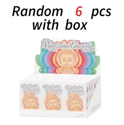 Box of 'Big into Energy' figurines with colorful packaging on a white background
