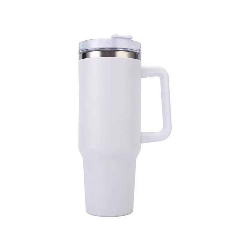 White travel mug with handle on a white background