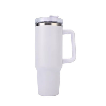 White travel mug with handle on a white background