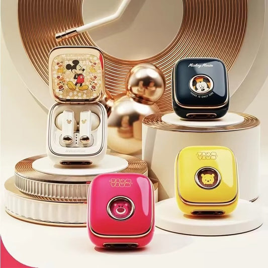 Colorful electronic devices with cartoon character designs on a decorative stand.