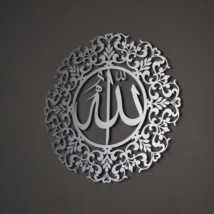 Decorative wall art with intricate patterns and 'Allah' text on a dark background